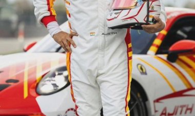 Ajith Kumar Poses with His Race Car At Barcelona F1 Circuit